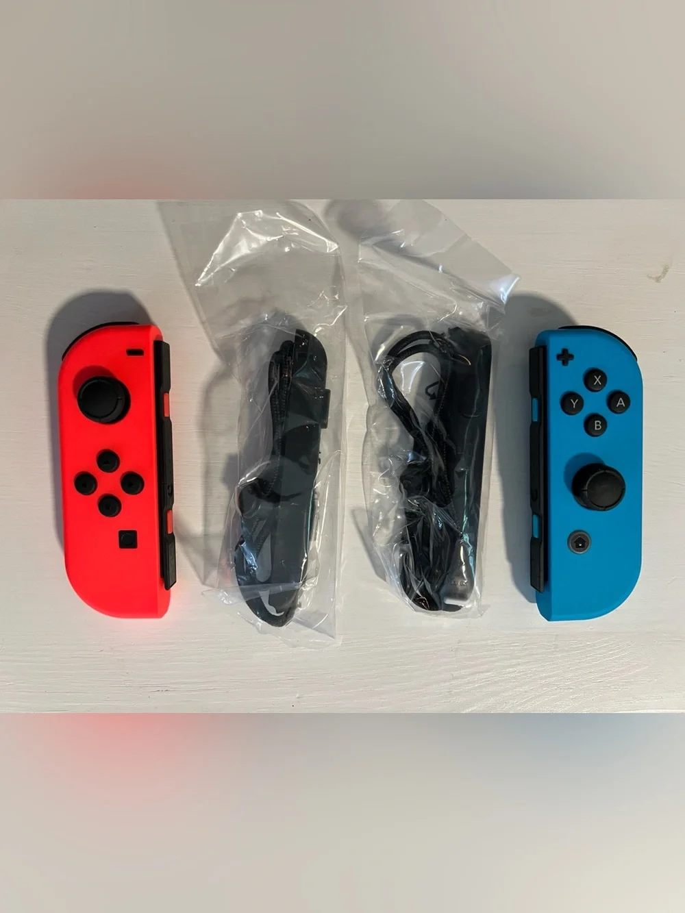 New in Box Nintendo Neon Red and Neon Blue Joy-Con Controller